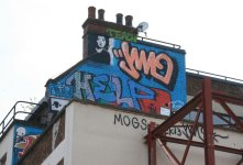 Graffiti_in_Shoreditch,_London_-_Rooftop_(13701291385).jpg