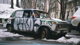 war-in-ukraine-latest-developments-abandoned-car-graffiti-kyiv-1200x675-1.jpg