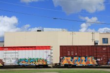 train-art-2573-two-cars-building.jpg